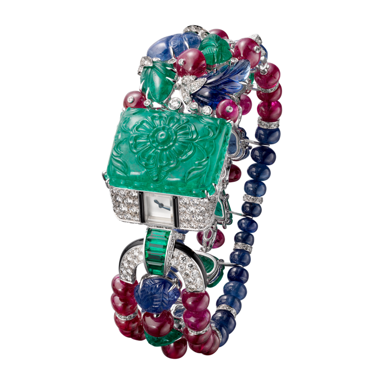 Tutti Frutti Agrafe高級珠寶表，白K金，鑲嵌1顆雕刻祖母綠總重約41.20克拉，手動機械機芯，約5,850萬元。圖／卡地亞提供