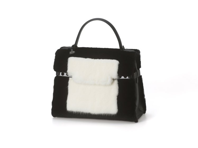 有熊貓包暱稱的Tempete系列黑白撞色水貂毛中型手提包，售價469,400元。圖／DELVAUX提供