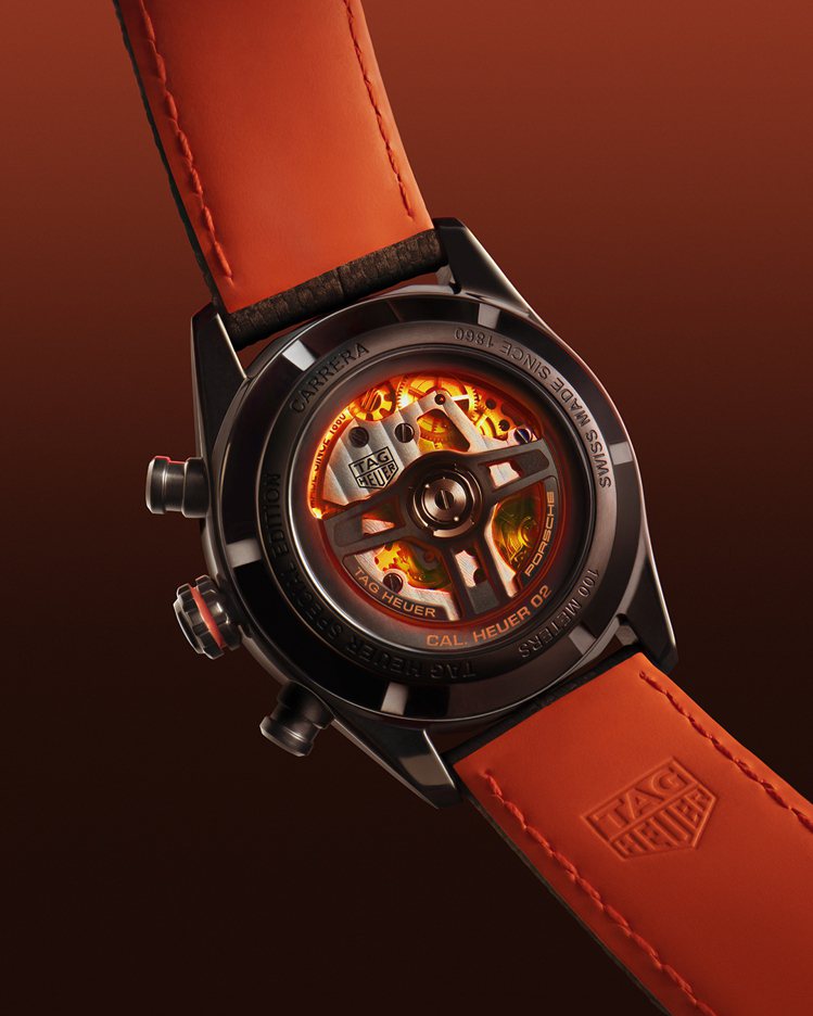 TAG Heuer X Porsche聯名限量腕表的特製自動盤，亦有橘色字樣。圖／TAG Heuer提供