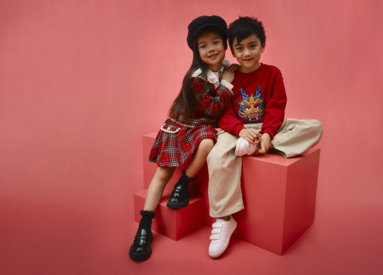 把捕捉遊龍、絢爛煙火與糖葫蘆等傳統意象，運用在H&M新春系列童裝的緞面背心、泰迪絨外套、小洋裝等單品。圖／H&M提供