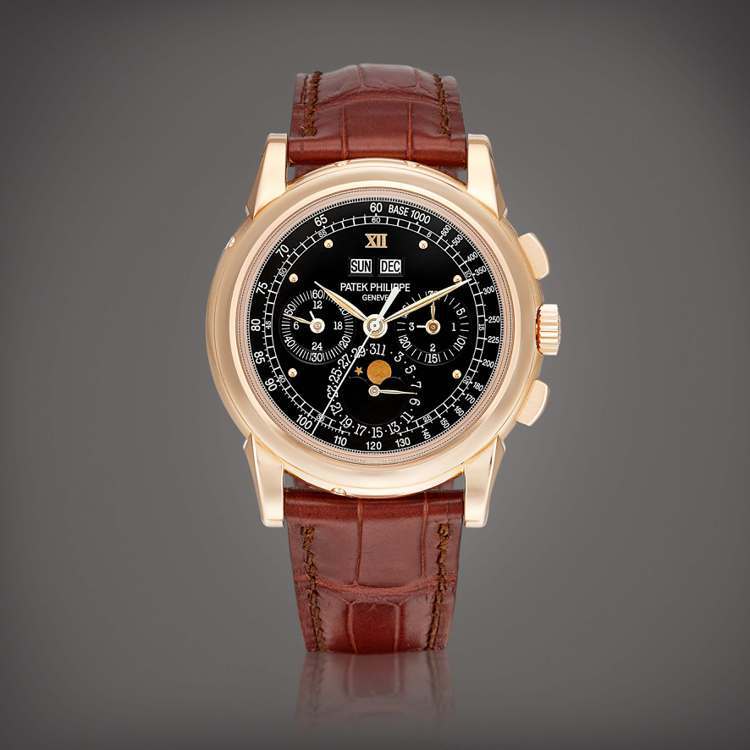 百達翡麗型號5970R-018粉紅金萬年曆腕表，配月相、24小時、閏年顯示及獨特黑色測速盤，約2011年製，估價400萬港元。圖／蘇富比提供