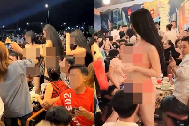 越南有餐厅搞性感派对，找来数名打扮性感的女郎，更叫顾客摸她们的私密部位及塞钱进去，现场有上百人群观，引起网友哗然。（网传影片截图）(photo:UDN)