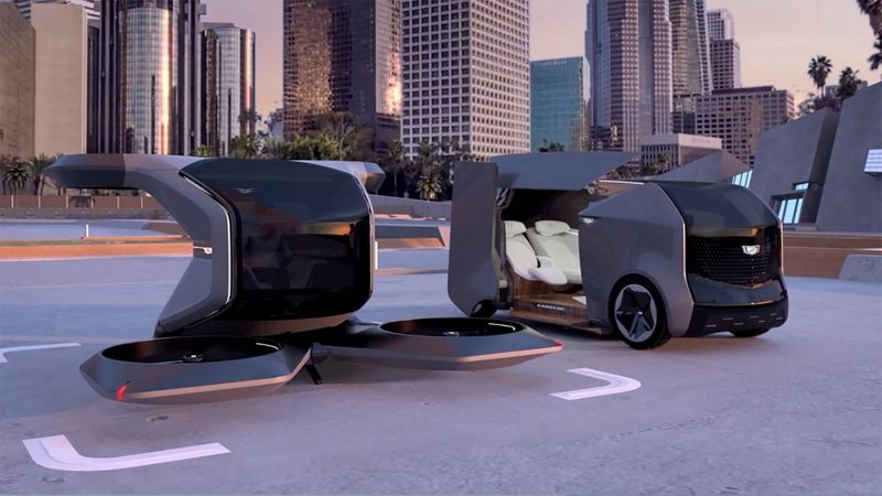 美国通用汽车（GM）12日在消费性电子展（CES）发表两款未来感十足的凯迪拉克概念车，包括全自主电动垂直起降飞天车（左）与家庭友善型电动旅行车（右）。路透/GM(photo:UDN)
