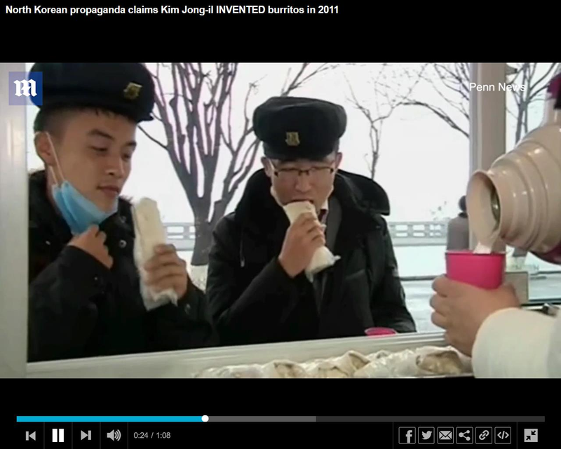 北韩官方发布的影片显示，北韩民众大啖卷饼。图／取自英国每日邮报(photo:UDN)