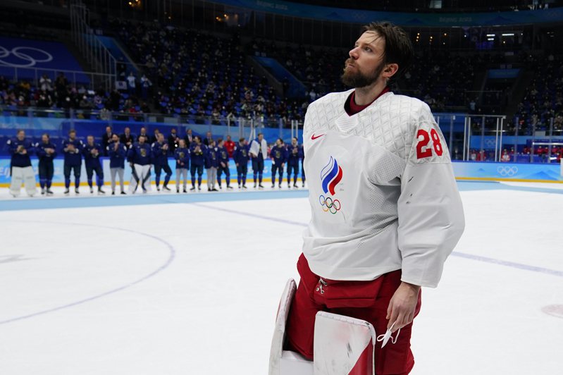 25岁的俄国冰球选手费多托夫今年在北京奥运获得男子团体银牌，图为他受奖画面。（美联社）(photo:UDN)
