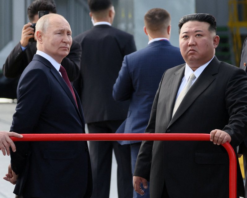 俄羅斯總統普亭（左）、北韓領導人金正恩（右）。路透社