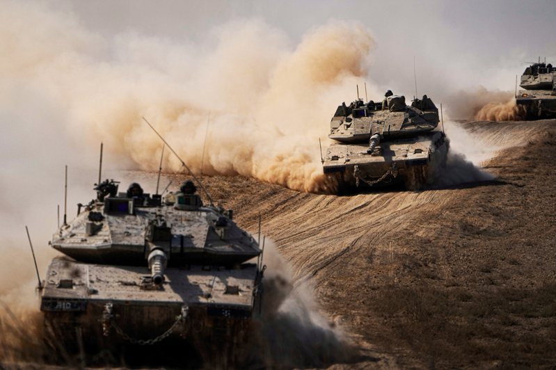 哈瑪斯集團（Hamas）武裝側翼今天指出，正在加薩（Gaza）兩處地點與以色列部隊發生戰鬥，稍早以色列表示已在巴勒斯坦自治區擴大地面行動。美聯社