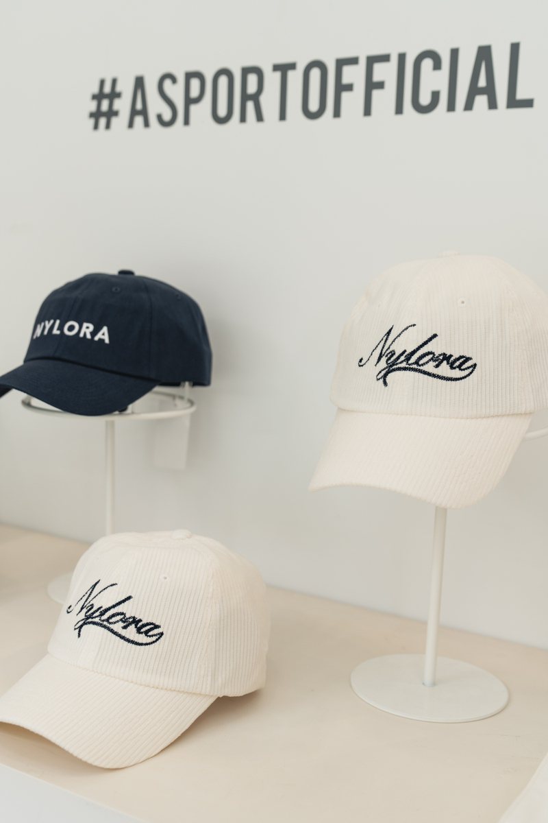 从即日起到6月16日为止，在ASPORT全台7间门市购买NYLORA商品，单笔消费满额，即赠棒球帽或托特包。图／ASPORT提供