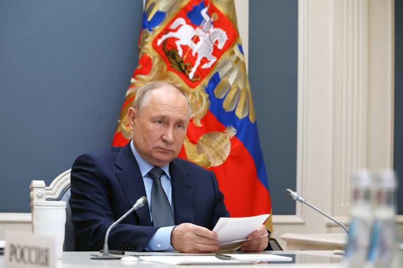 俄羅斯總統普亭22日在20國集團（G20）視訊會議上發表談話。（美聯社）