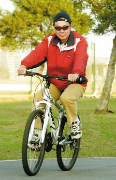 李國光非常講究運動的質與量，騎腳踏車是他喜愛的運動。 記者屠惠剛/攝影
