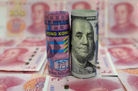 在聯繫匯率制度下，港幣掛鉤美元，港股沒有辦法如新台幣一樣享受「貶值效應」，再加上高利息拖累，打擊了香港經濟及股市。（路透）
