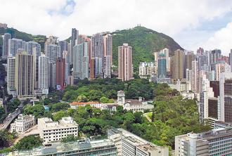 亞洲REITs近期走勢有翻多趨勢。圖為香港大樓。 （彭博資訊）