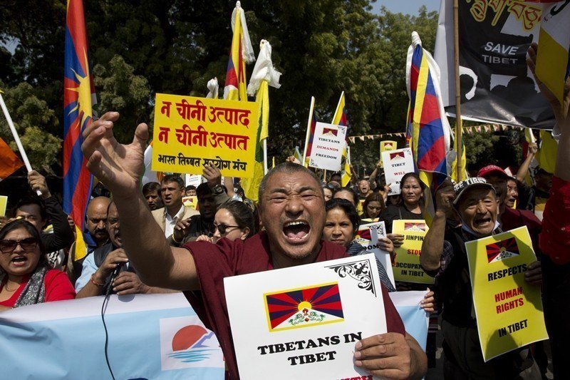 3月10日，西藏抗暴60週年大遊行，攝於印度新德里。 圖／美聯社