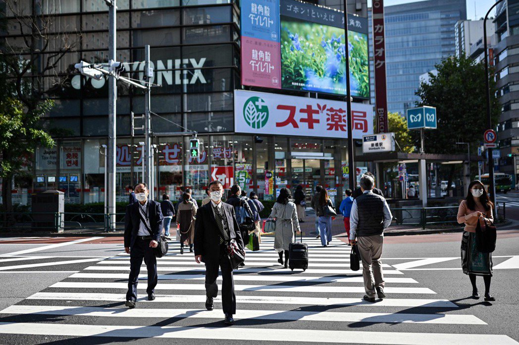 圖為日本東京行人步行示意圖。 圖／法新社