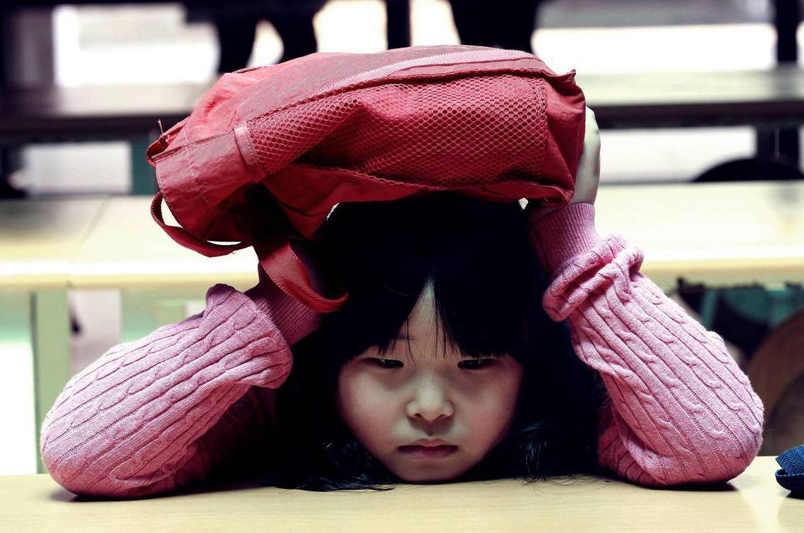 南韓校園暴力正邁向低齡化的危機事態。圖為南韓小學生示意圖，非當事人。 圖／美聯社