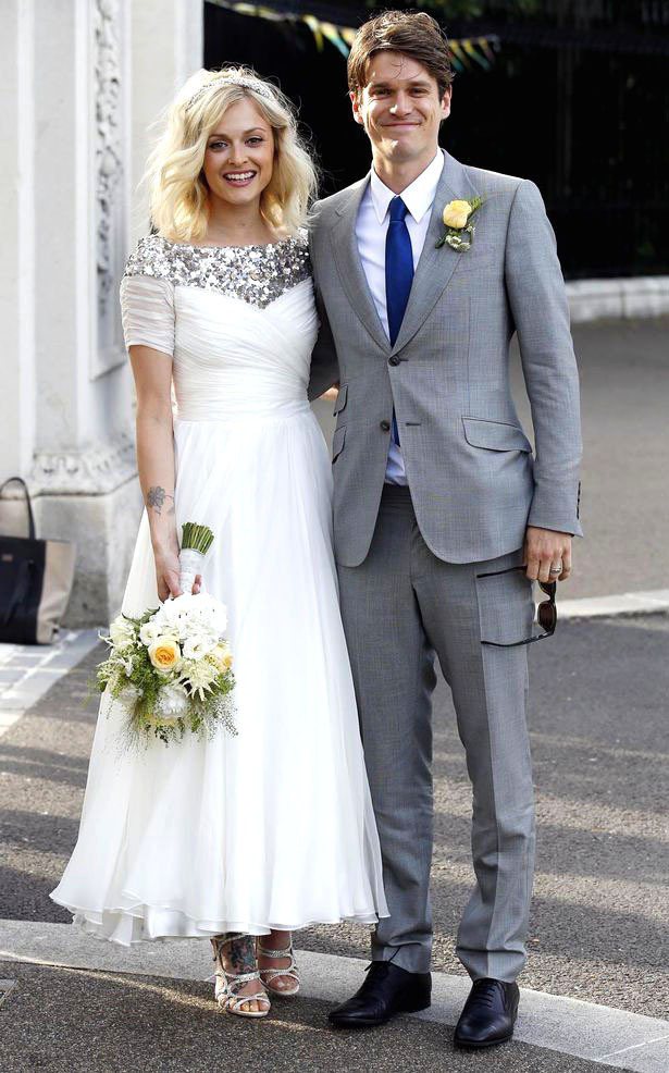 英國 BBC 女主播菲妮柯頓這個月才和男友 Jesse Wood 完婚，在婚前已生下一子的兩人正展開甜蜜的新婚生活。圖／擷取自英國鏡報