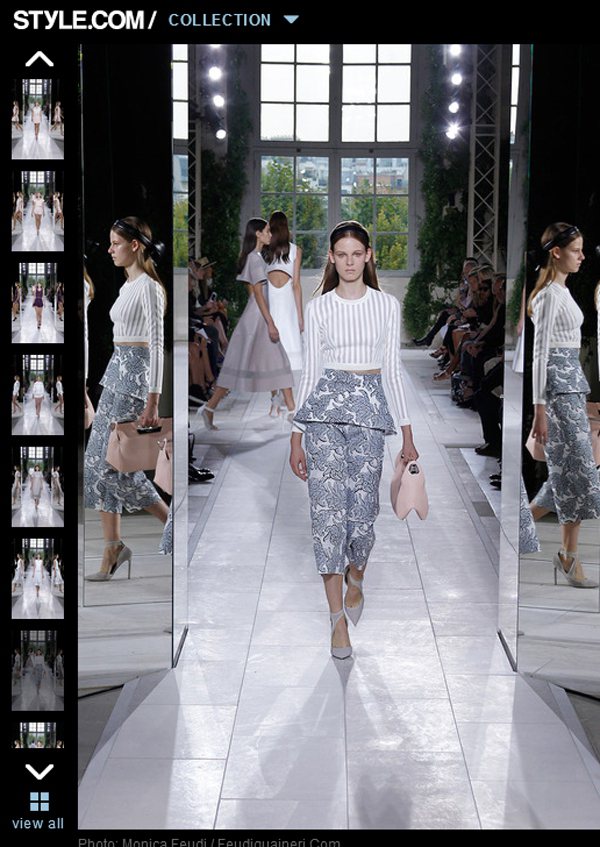 王大仁為 Balenciaga 設計的 2014 春夏系列，更強調了誇張的剪裁線條、透視元素與簡約印花設計。圖／擷取自style.com