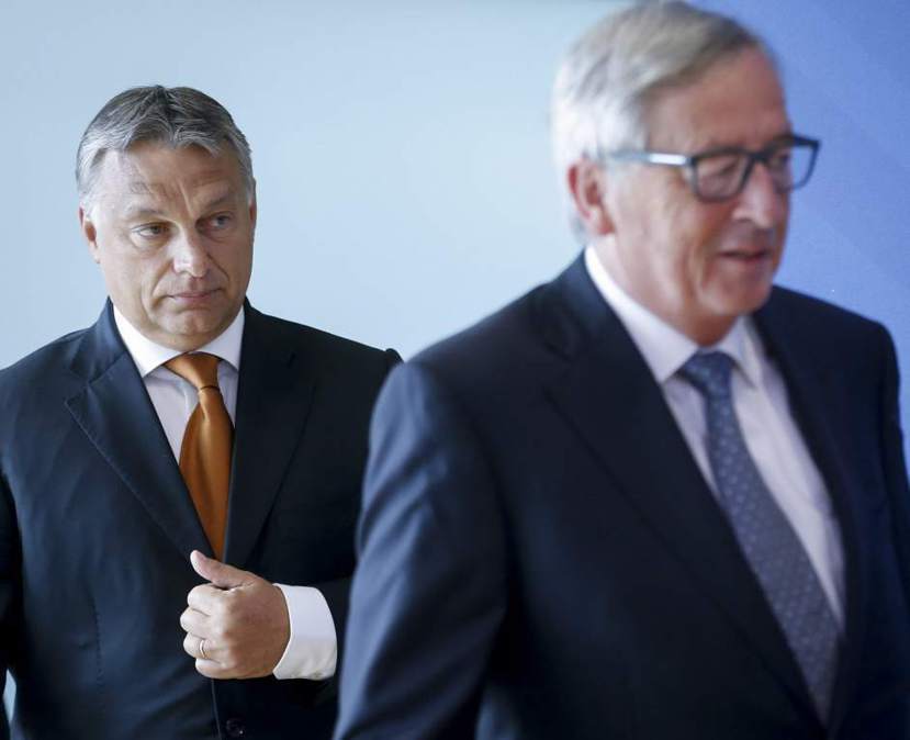 匈牙利總理奧班 （左）跟歐盟執委會主席容克（右）。 圖／歐新社
