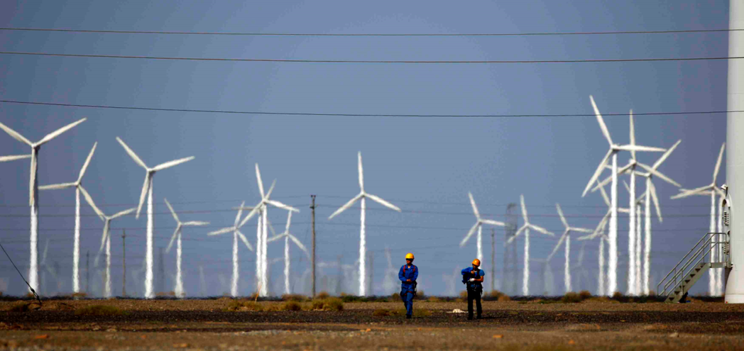 在風力發電的產業中，中國市場的龐大產能攤平了節節高升的人力成本。 圖／路透社