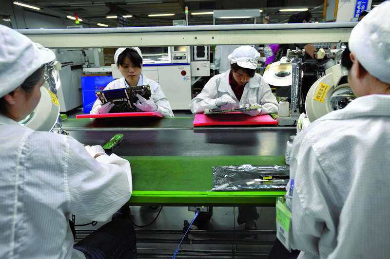 過去中國便宜的勞動力，是鴻海成功的因素。 ◎法新社