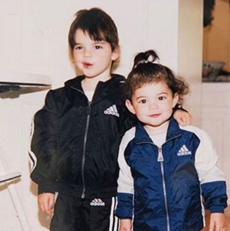 Kendall Jenner在臉書曾貼上兒時穿上adidas運動服的照片。圖／摘...