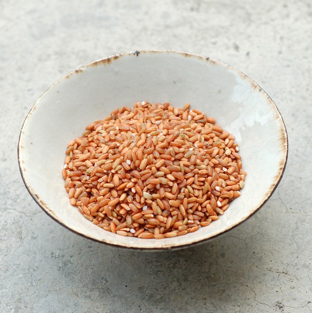 台灣原生種紅米因烹煮不易，消費者購買意願不高，促使顧瑋開發新產品。圖／顧瑋提供