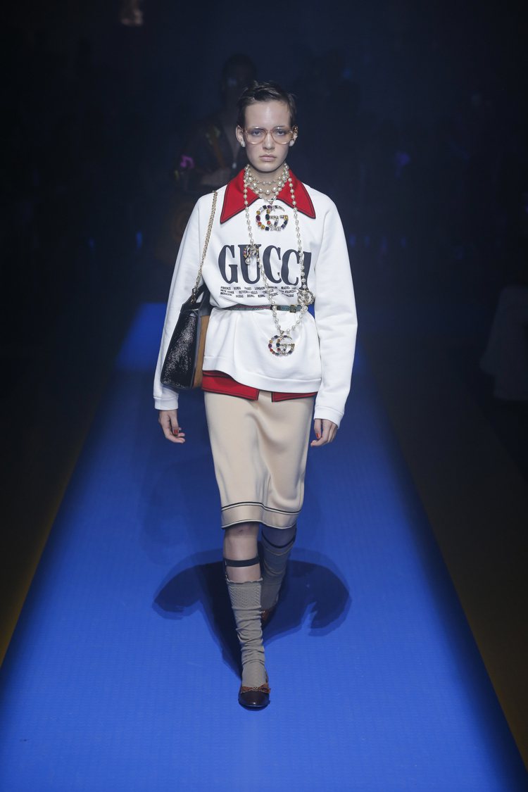 經典的織帶元素與品牌logo也持續出現在服裝上。圖／Gucci提供