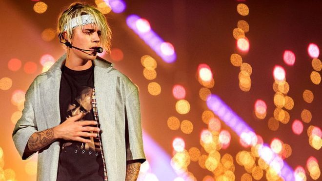 2014年歌手賈斯汀•比伯（Justin Bieber）發了一張他在東京參拜有爭...