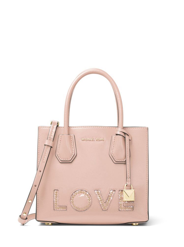 Mercer粉色LOVE小方包，售價17,000元。圖／MICHAEL KORS提供