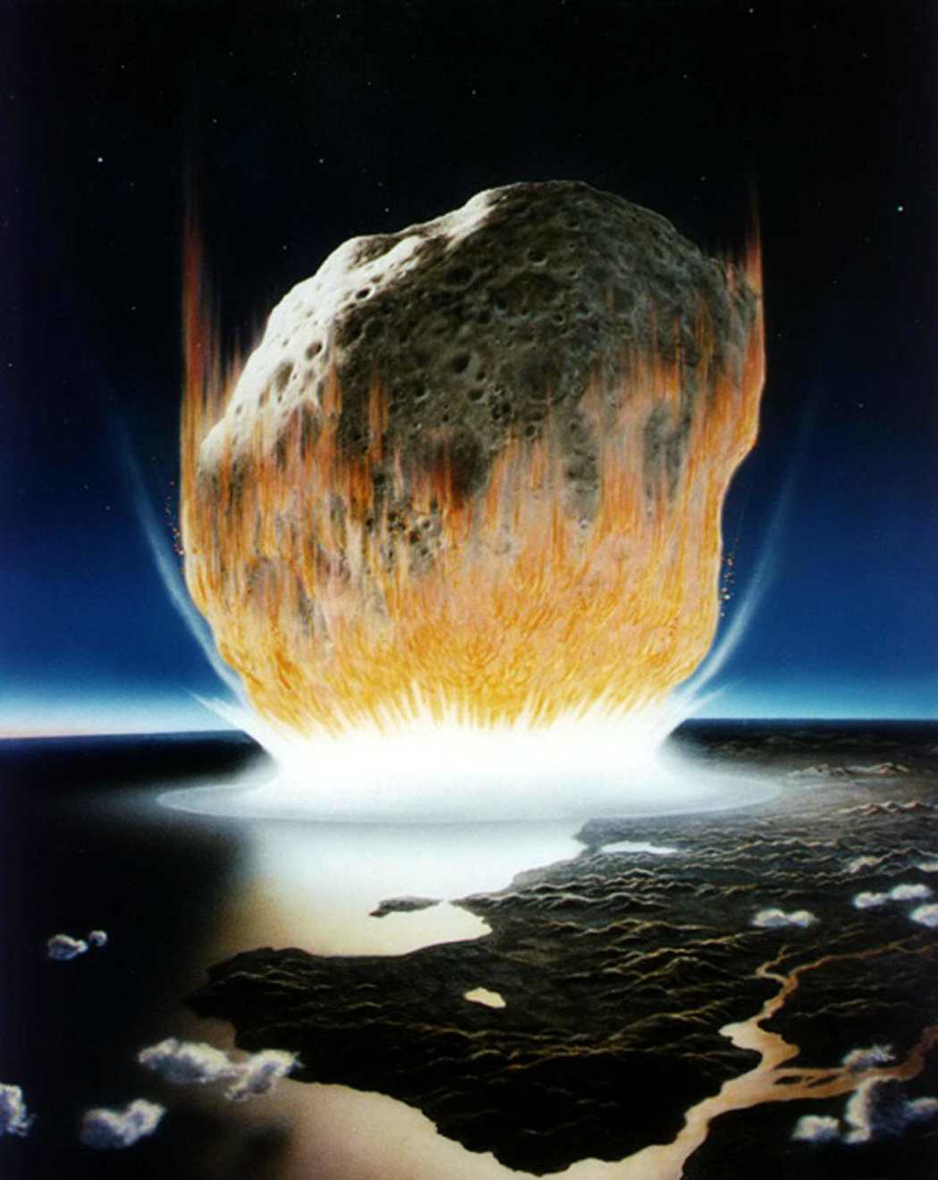 藝術家想像約6600萬年前小行星撞擊地球的畫面。路透