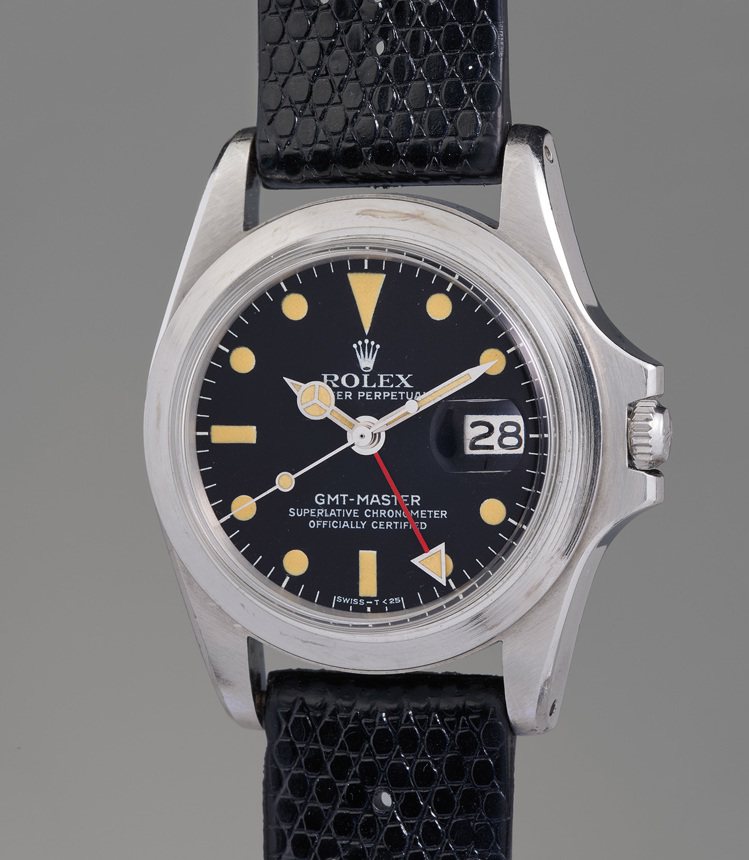 已故金獎影帝馬龍白蘭度於電影《現代啟示錄》中配戴的勞力士「Day-Date」型號1803腕表。圖 / 富藝斯提供。