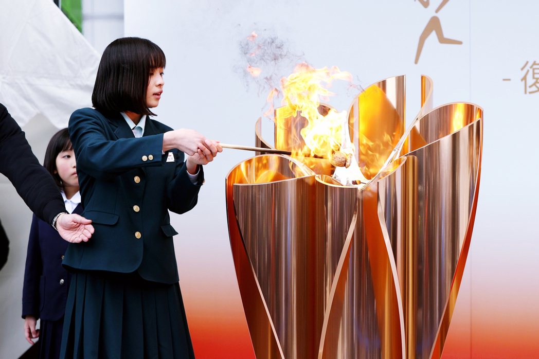 3月24日，福島的「復興之火」活動。不料同日晚，日本即宣布延後東京奧運。 圖／歐...