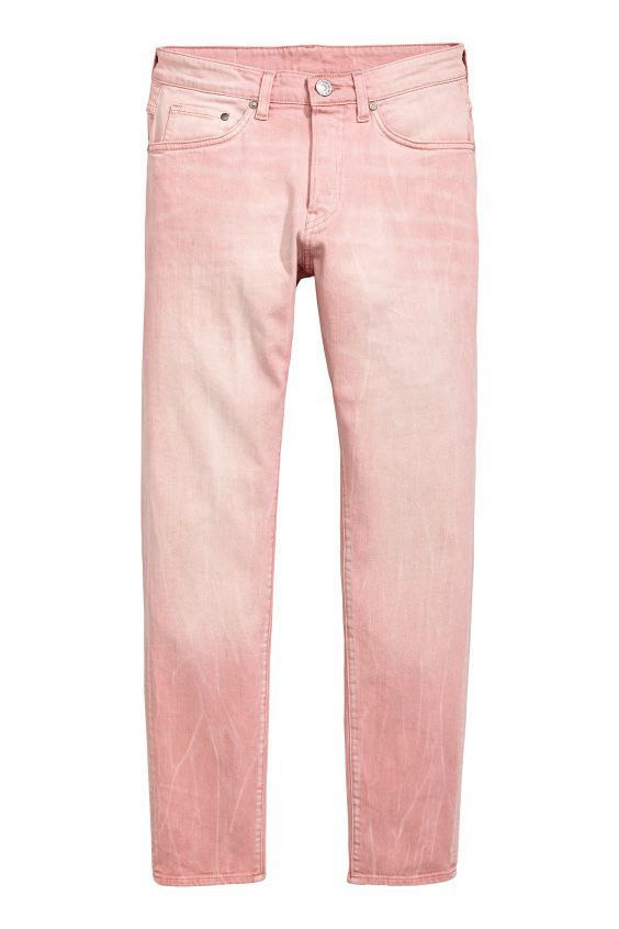 H&M洗舊質感粉紅色緊身牛仔褲1,100元。圖／H&M提供