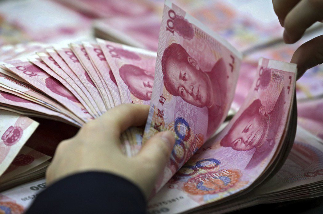 中國人民銀行宣布，將在深圳、成都、蘇州、北京郊區雄安等四地試行「數位人民幣」。示意圖。 圖／美聯社