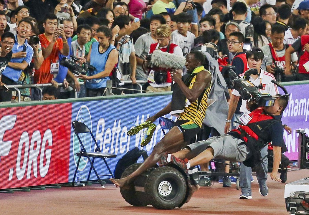2015年，在北京舉行的「世界田徑錦標賽」上，奪冠的世界紀錄保持人——博爾特（U...