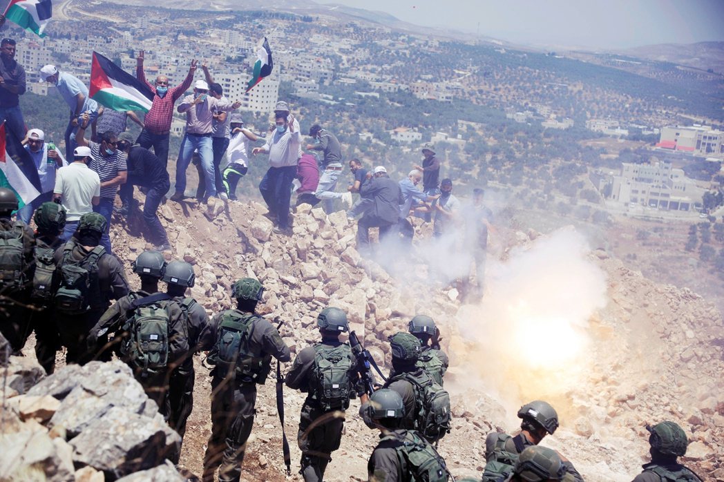 圖為今年7月，以以色列軍隊與巴勒斯坦示威者爆發衝突。 圖／路透社