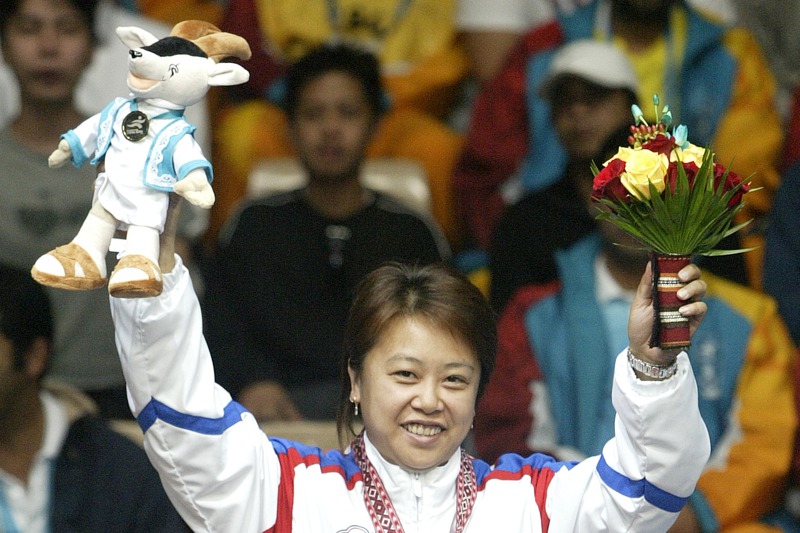 2006年12月11日，柳信美（見圖）在多哈亞運女子9號球決賽中擊敗馬來西亞關雪兒拿下金牌。圖／聯合報系資料照片