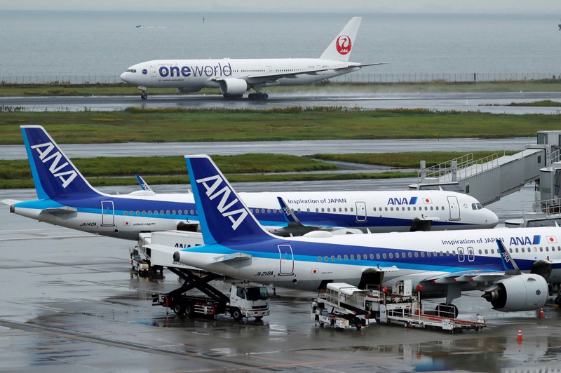 全日空、日本航空兩個「死對頭」都不想整合為一家公司。路透