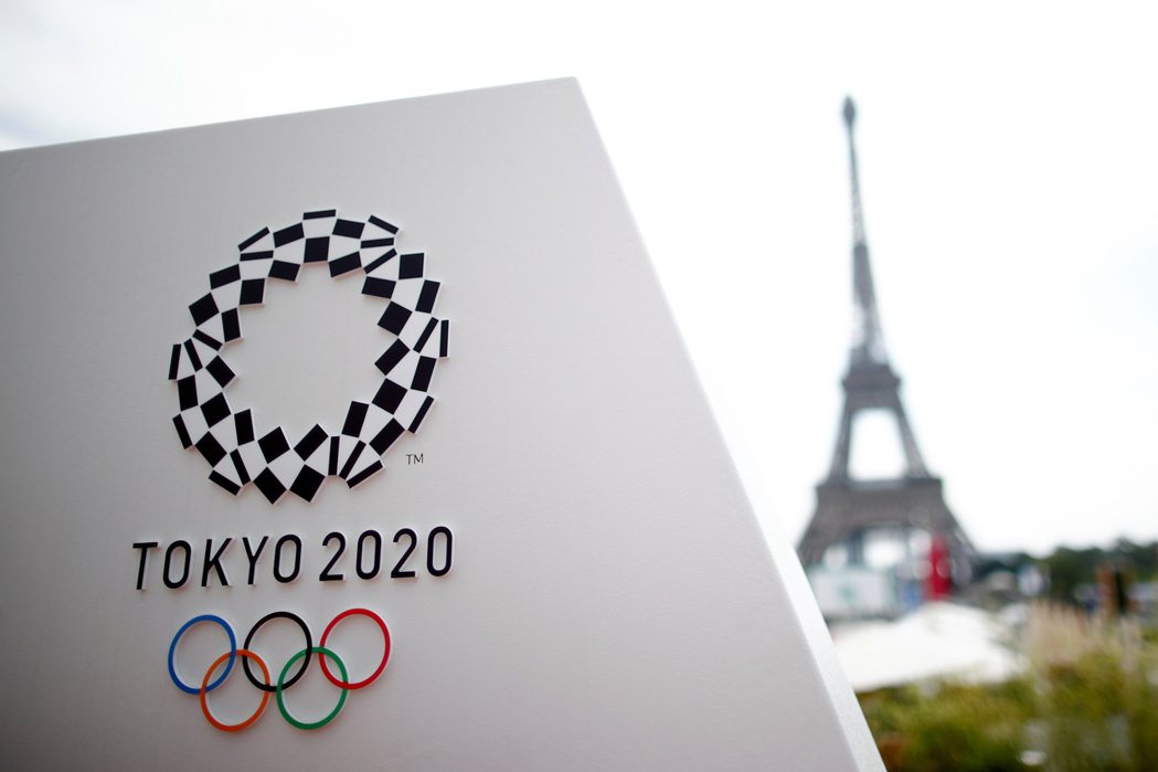 圖為2020年東京奧運與巴黎艾菲爾鐵塔，法國巴黎為2024年奧運舉辦地。 圖／路透社