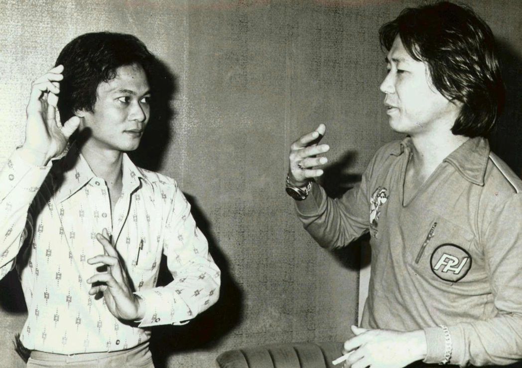 陳軍堡(左)與張鵬翼(右)討論詠春拳技巧。本報資料照片