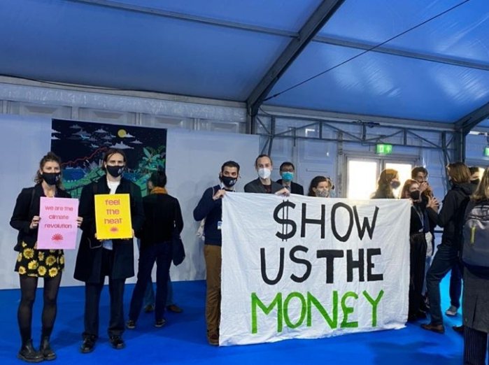COP26會場訴求投入資金因應氣候變遷的示威群眾。 圖／陳惠萍提供