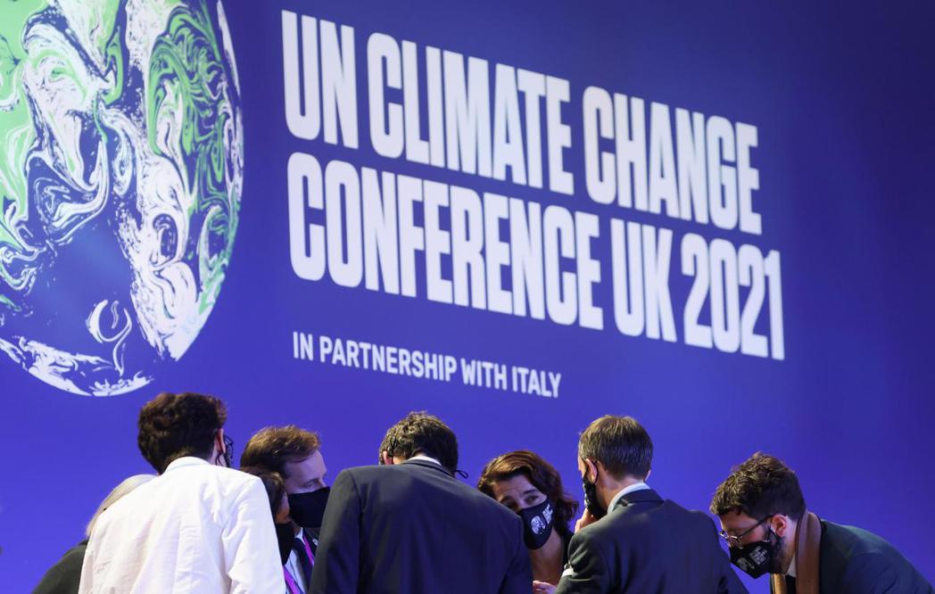 圖為本年在蘇格蘭舉行的第26屆全球年度氣候峰會。 圖／路透社