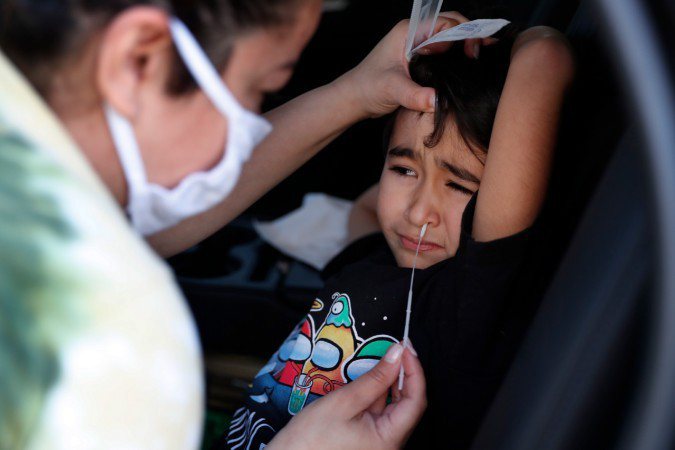 图为美国一处快筛站，正为一名儿童进行检测。欧新社(photo:UDN)