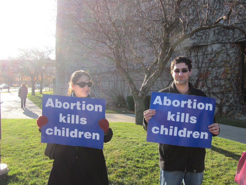 美国民众高举「堕胎杀害婴儿」，反对妇女进行堕胎。（Photo on Flickr under C.C. License）(photo:UDN)