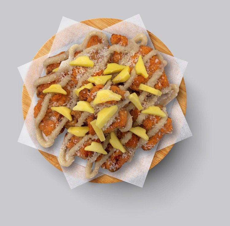 除了榴槤比薩，必勝客還加碼祭出獨家副食「榴槤起司唐揚雞」。圖／必勝客提供
