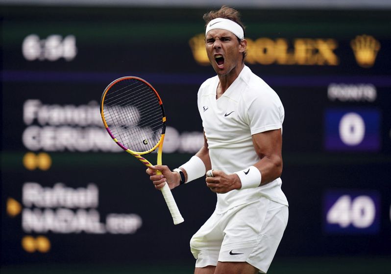 APTOPIX Britain Wimbledon Tennis
Spain’s Rafael Nadal reacts after winning a point against Argentina's Francisco Cerundolo in a first round men’s singles match on day two of the Wimbledon tennis championships in London, Tuesday, June 28, 2022. (John Walton/PA via AP) 美聯社