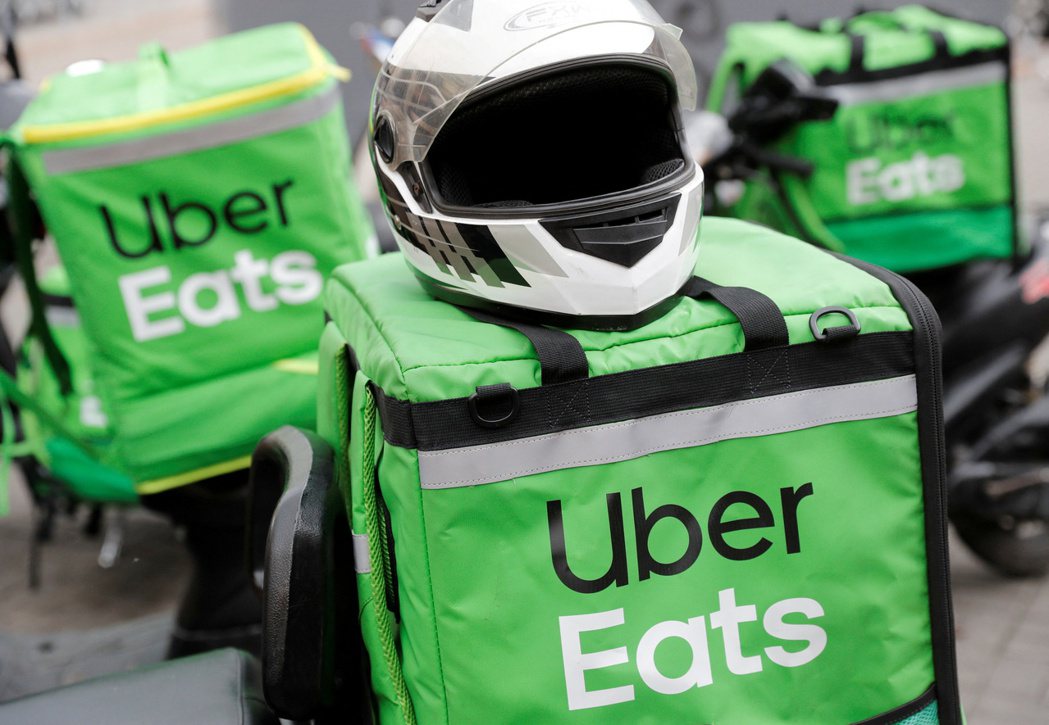 Uber Eats等食物外送平台正面對疫後市場現實：顧客成長減速。圖／路透