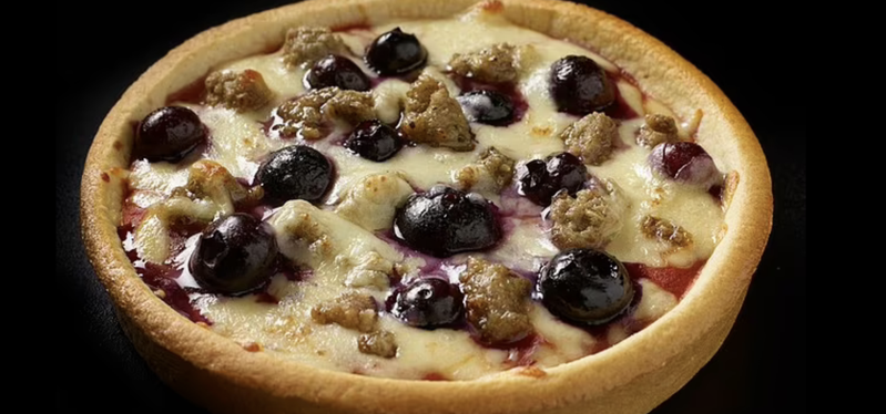 Chicago Town推出蓝莓披萨引起了像夏威夷披萨的讨论。图撷自(photo:UDN)