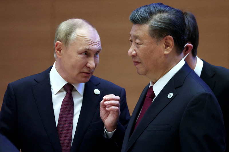 俄羅斯總統普亭（左）在15日舉行的「習普會」上，表態支持中國對台灣的立場。路透