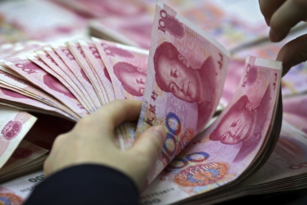 中國人民銀行25日宣布，決定於12月5日降準1碼（降低金融機構存款準備金率0.2...